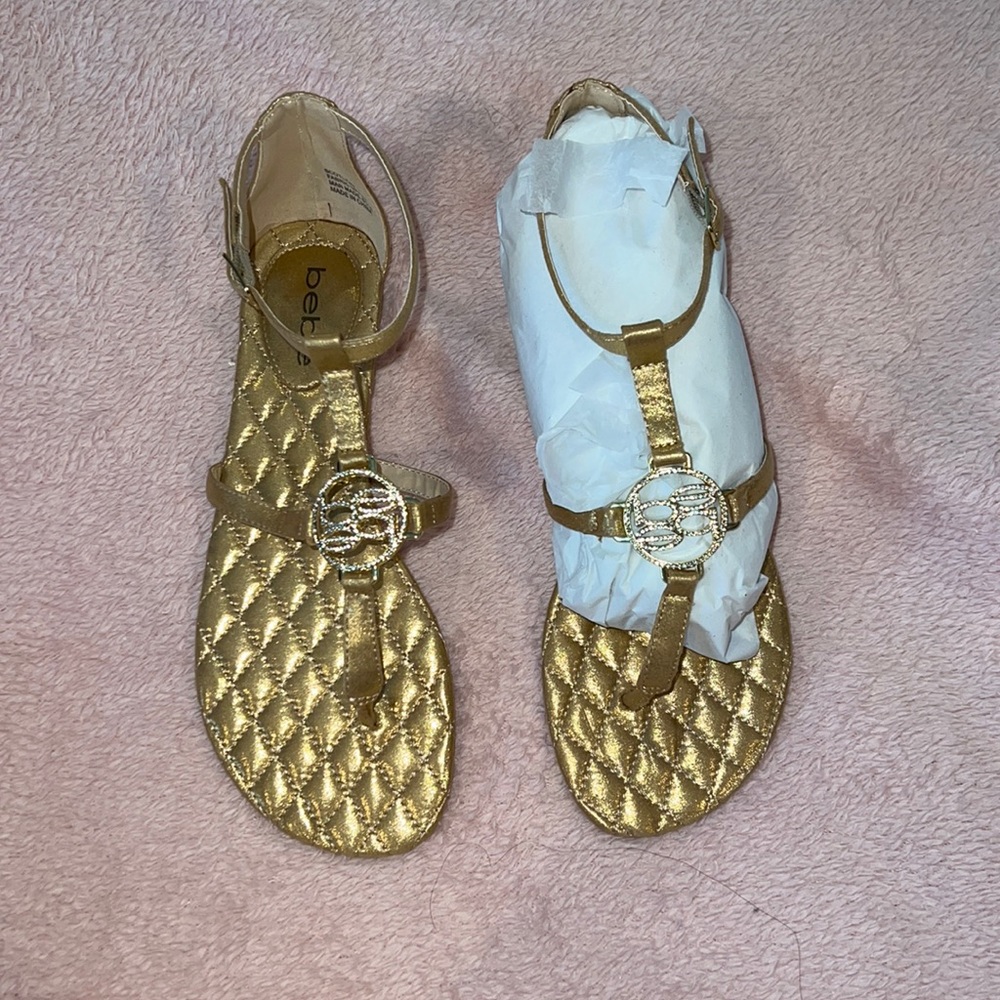 BRAND NEW WITH BOX! Never been worn bebe gold logo sandals! ⚡️✨✨✨✨⚡️⚡️
